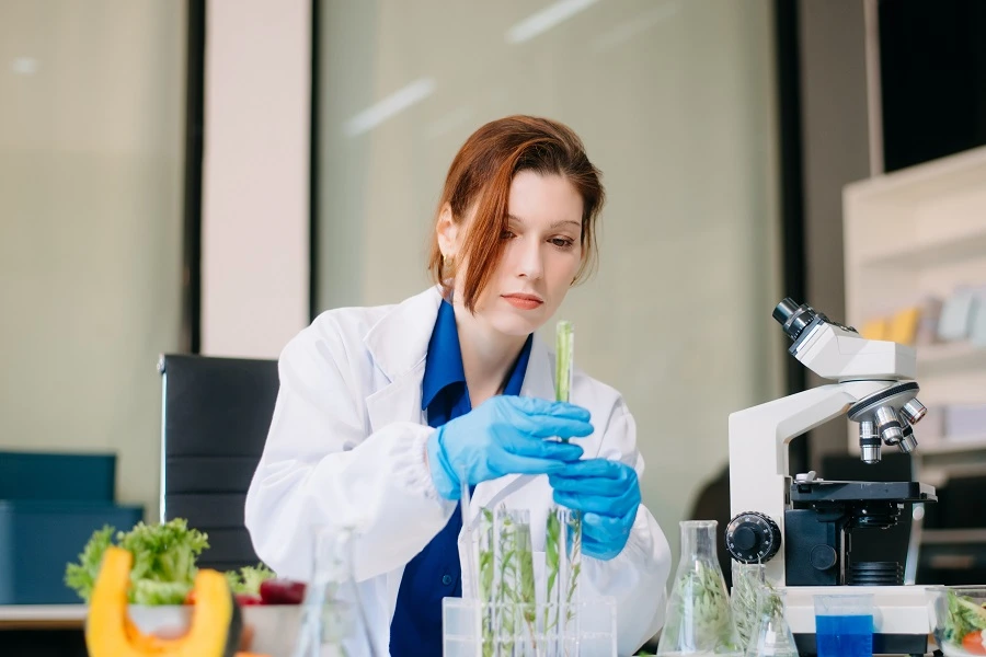 female scientist in lab testing foods